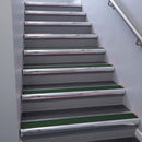 Polished Aluminium bullnose stair nosing 68x40mm with Spruce Castellated insert, fitted to an interior stairwell