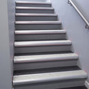 Satin Aluminium bullnose stair nosing 68x40mm with Cloud Castellated insert, fitted to an interior stairwell