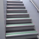 Satin Aluminium bullnose stair nosing 68x40mm with Jade Castellated insert, fitted to an interior stairwell