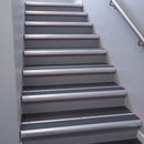 Satin Aluminium bullnose stair nosing 68x40mm with Regency Castellated insert, fitted to an interior stairwell