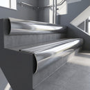 Polished Aluminium bullnose stair nosing with Satin Aluminium infill, fitted to concrete steps in a commercial stairwell