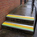 57x55mm external rake back stair nosing with yellow Tredsafe coarse grit insert and green photoluminescent strip fitted to wet outdoor concrete steps