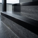 Aluminium Stair Nosing 59mm Tread Raked Back Profile in black anodised finish fitted on a step edge