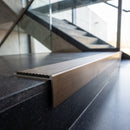 Aluminium Stair Nosing 59mm Tread Slimline Square-Back Profile in bronze finish fitted on a step edge