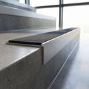 Slimline square back stair nosing 59x30mm in mill aluminium finish fitted on a step edge