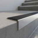 Aluminium Stair Nosing 59mm Tread Slimline Square-Back Profile in satin-aluminium finish fitted on a step edge
