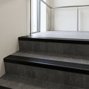 Black Anodised square edge aluminium stair nosing with Black Smooth Textured infill, fitted to a concrete step