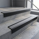 Black Anodised finish with Flint Castellated insert - Aluminium Stair Nosing 59x30mm Square Back fitted to a step edge