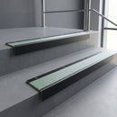 Black Anodised square edge aluminium stair nosing with Jade Castellated infill, fitted to a concrete step