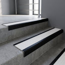 Black Anodised finish with White Castellated insert - Aluminium Stair Nosing 63.3x30mm Square Front fitted to a step edge