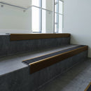 Bronze finish with Black Olympic Grip - Slimline Square Back Stair Nosing 59x30mm Aluminium fitted to a step edge