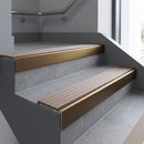 Bronze finish with Fawn Castellated insert - Slimline Square Back Stair Nosing 59x30mm Aluminium fitted to a step edge