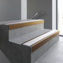 Bronze square edge aluminium stair nosing with Satin Aluminium infill, fitted to a concrete step