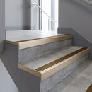 Light Bronze square edge aluminium stair nosing with Bronze Aluminium infill, fitted to a concrete step