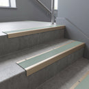 Light Bronze finish with Jade Castellated insert - Aluminium Stair Nosing 63.3x30mm Square Front fitted to a step edge
