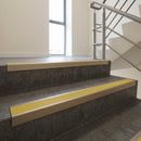 Light Bronze finish with Yellow Castellated insert - Aluminium Stair Nosing 63.3x30mm Square Front fitted to a step edge