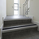 Mill Aluminium finish with Black Olympic Grip - Aluminium Stair Nosing 59x30mm Slimline Square Back fitted to a step edge