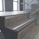 Mill Aluminium square edge aluminium stair nosing with Flint Castellated infill, fitted to a concrete step
