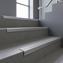 Mill Aluminium square edge aluminium stair nosing with Mill Aluminium infill, fitted to a concrete step