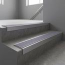 Mill Aluminium square edge aluminium stair nosing with Nimbus Castellated infill, fitted to a concrete step