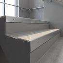 Mill Aluminium square edge aluminium stair nosing with Porth Stone Castellated infill, fitted to a concrete step