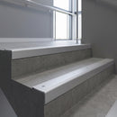 Mill Aluminium square edge aluminium stair nosing with Satin Aluminium infill, fitted to a concrete step
