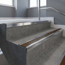 Polished Aluminium square edge aluminium stair nosing with Bronze Aluminium infill, fitted to a concrete step