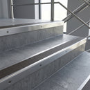 Polished Aluminium square edge aluminium stair nosing with Granite Castellated infill, fitted to a concrete step