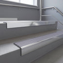 Polished Aluminium finish with Nimbus Castellated insert - Aluminium Stair Nosing 59x30mm Slimline Square Back fitted to a step edge