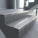 Polished Aluminium square edge aluminium stair nosing with Polar Grey Castellated infill, fitted to a concrete step