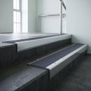 Polished Aluminium finish with Regency Castellated insert - Aluminium Stair Nosing 59x30mm Slimline Square Back fitted to a step edge