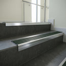 Polished Aluminium square edge aluminium stair nosing with Spruce Castellated infill, fitted to a concrete step