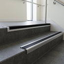 Satin Aluminium finish with Black Smooth Textured insert - Aluminium Stair Nosing 59x30mm Slimline Square Back fitted to a step edge