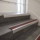 Satin Aluminium finish with Claret Castellated insert - Aluminium Stair Nosing 59x30mm Slimline Square Back fitted to a step edge