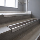 Satin Aluminium finish with Granite Castellated insert - Aluminium Stair Nosing 59x30mm Slimline Square Back fitted to a step edge