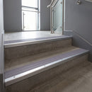 Satin Aluminium square edge aluminium stair nosing with Nimbus Castellated infill, fitted to a concrete step