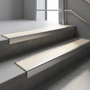 Satin Aluminium square edge aluminium stair nosing with Porth Stone Smooth Textured infill, fitted to a concrete step