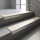 Satin Aluminium finish with Porth Stone Smooth Textured insert - Aluminium Stair Nosing 59x30mm Slimline Square Back fitted to a step edge