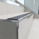 Polished aluminium raked back stair nosing 63.5x30mm fitted on a step edge