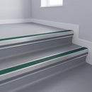 Jade Castellated insert in a 66x55mm square front aluminium stair nosing with 13mm Light Grey riser highlight, fitted to interior steps