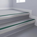 Jade Castellated insert in a cut to size 66x55mm aluminium stair nosing with 13mm Polar Grey riser highlight, fitted to interior steps