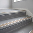 Light Bronze Aluminium insert in a cut to size 66x55mm aluminium stair nosing with 13mm Light Grey riser highlight, fitted to interior steps