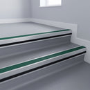 Jade Castellated insert in a 66x55mm square front aluminium stair nosing with 13mm black riser highlight, fitted to interior steps