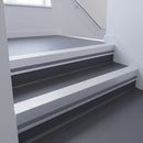 Satin Aluminium insert in a cut to size 66x55mm aluminium stair nosing with 13mm Light Grey riser highlight, fitted to interior steps
