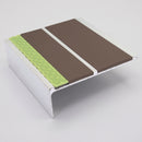 91x32mm aluminium stair nosing profile showing two brown PVC inserts, a mill aluminium rib and a green photoluminescent nose strip