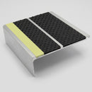 91x32mm aluminium stair nosing profile with two coarse black Tredsafe inserts, a mill aluminium rib and a green photoluminescent nose strip