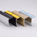 Double insert chevron stair nosing lengths in mill, satin black, satin gold and mirrorflect silver finishes