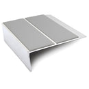 93x32mm rakeback aluminium stair nosing with twin Dolphin Grey anti-slip PVC inserts across the tread