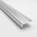 Bright silver anodised aluminium stair nosing profile on a plain white background, showing the rounded nose, the countersunk fixing hole and the tread plate thinning to a feather edge at the back