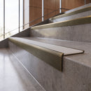 Antique Brass anti-slip stair nosing with snow white ridged PVC insert fitted to concrete steps
